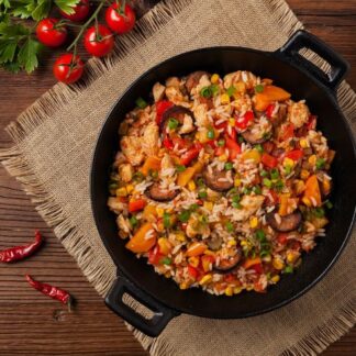 jambalaya seen from above in a cast iron pan